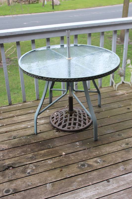 lot 65 image: Glass Top Patio Table w Umbrella, 8-Stackable Chairs
