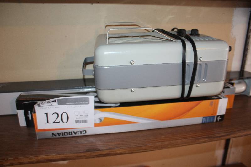 lot 120 image: Shelf Lot Includes 1) Intertek Space Heater AND 1) 24in. Wall Grab Bars