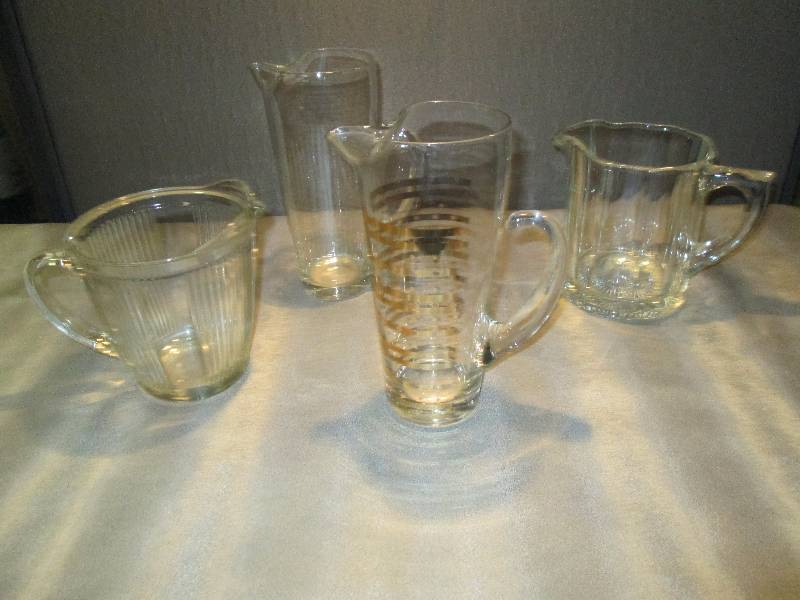 4 Assorted Collectible Glass Pitche...