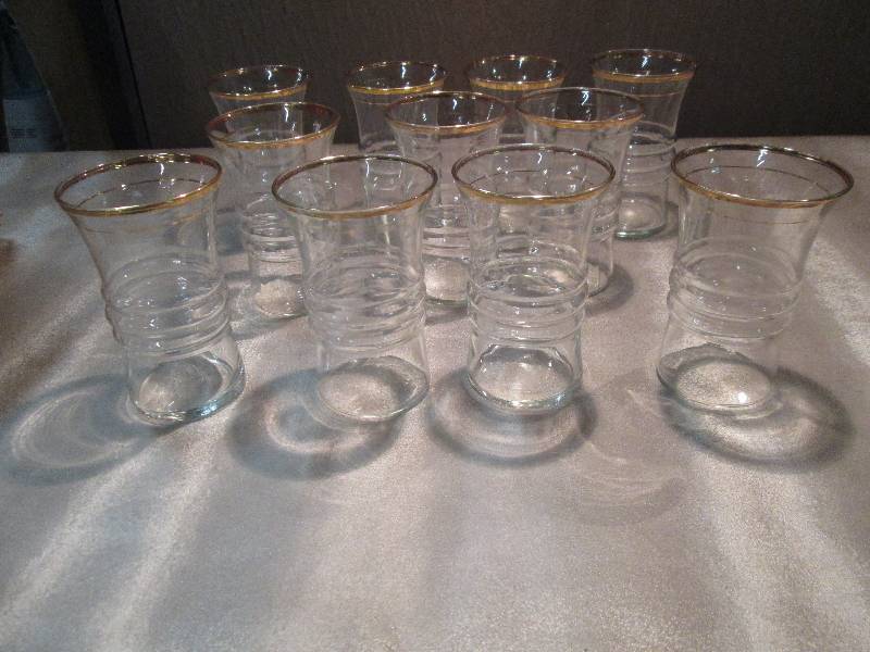 11 Gold Rimmed Glasses...