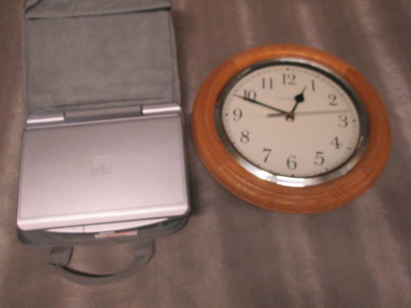 Wall Clock & Portable DVD Player...