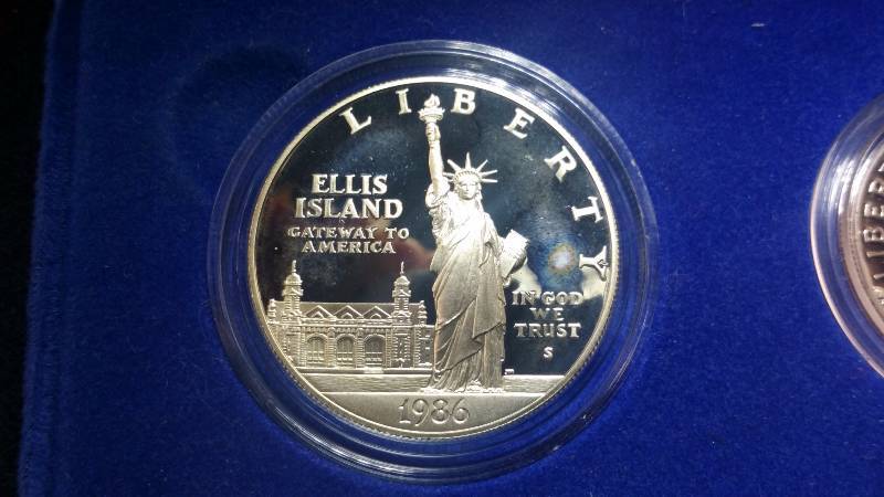 1986 S Ellis Island Silver Dollar & Half Dollar