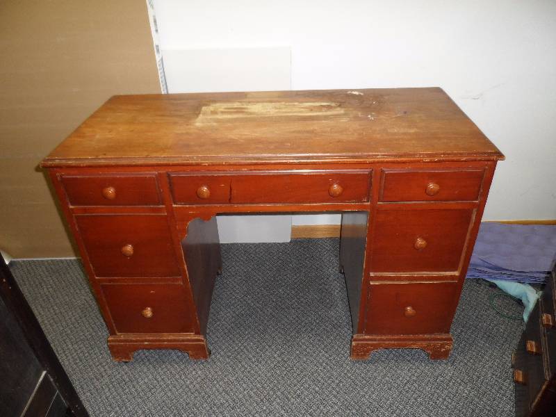 lot 18 image: 7 Drawer wood Desk, solid.