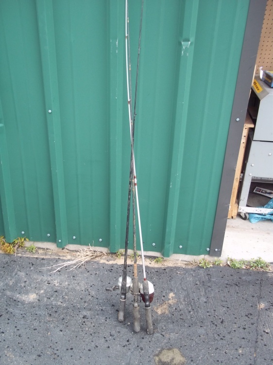 lot 18 image: Set of 3 rods and 3 reels.