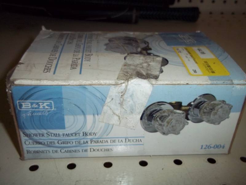 lot 42 image: New in box, shower stall faucet body.