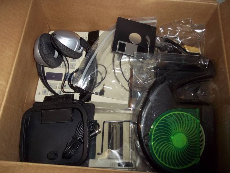 lot 87 image: 2 Adding Mancines, Stereo Hedphones, Sony AM Loop Entenna, Lunalite power Surge Control.
