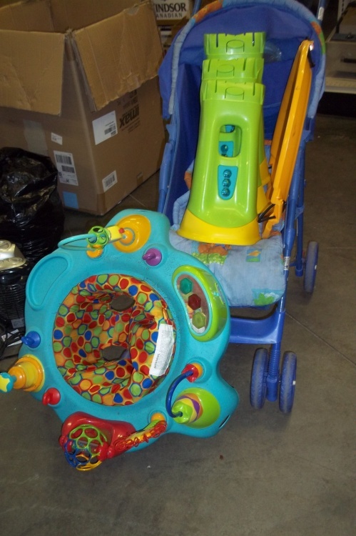 lot 121 image: Stroller and baby Activity Center