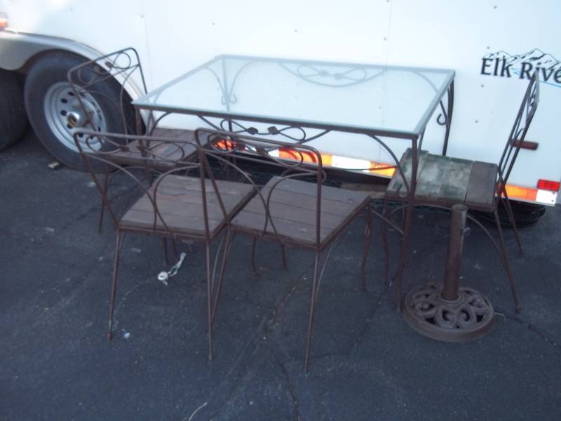 lot 212 image: Outdoor Table and 4 Chairs Glass table top