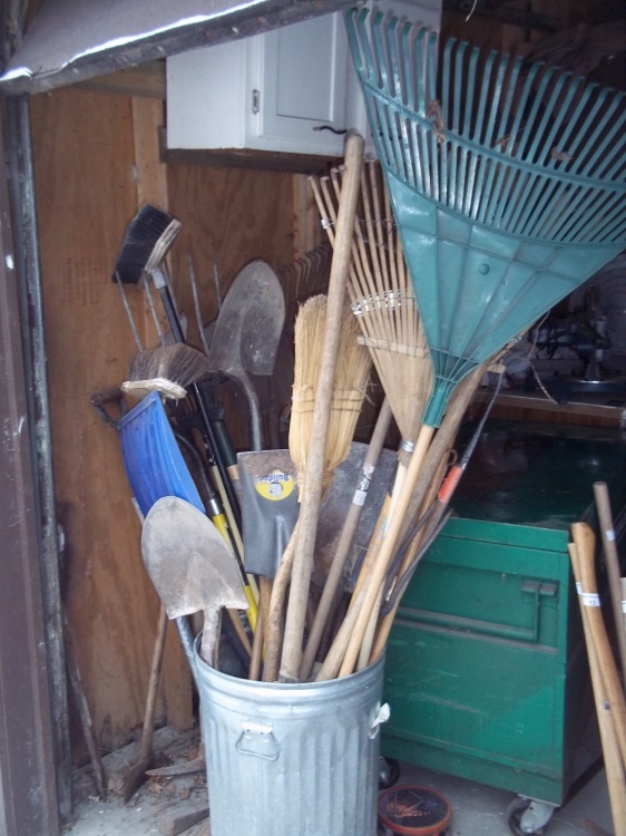 lot 15 image: Assortment of shovels, rakes and brooms  includes garbage can