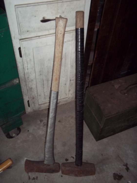 lot 19 image: Pair of mauls with taped handles