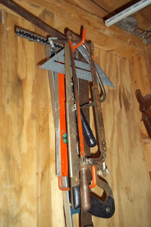 lot 94 image: Lot of hack saws and levels