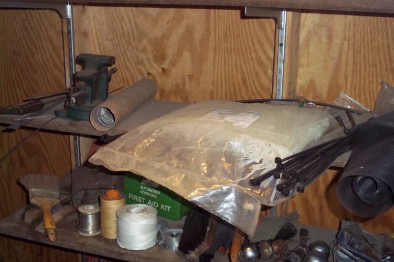 lot 97 image: Lot of 3 shelves includes ball hitches, air hosae ends, etc