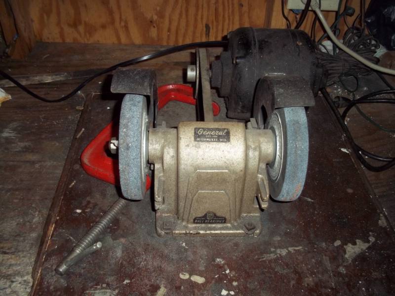 lot 100 image: Bench Grinder with large c clamps