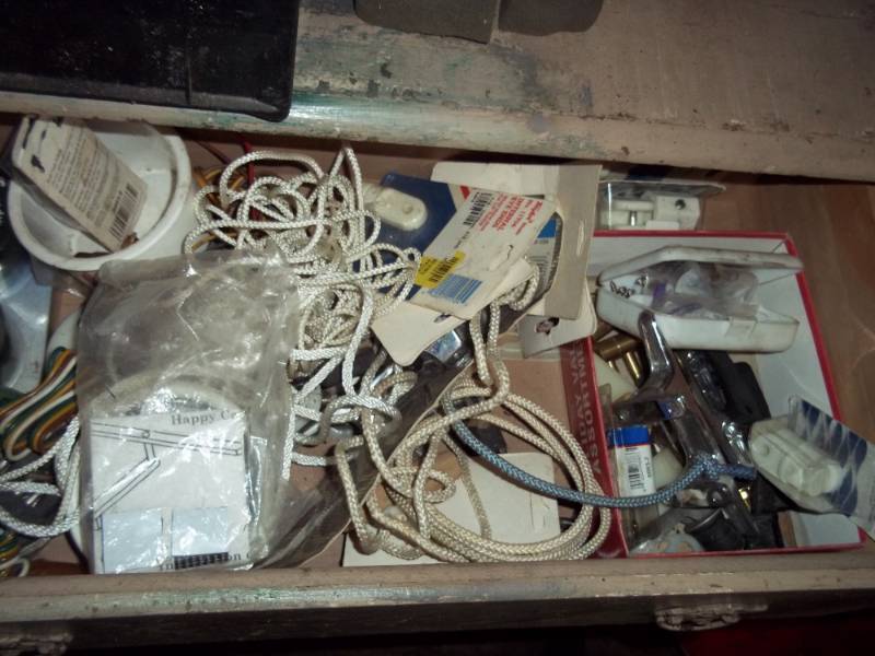 lot 125 image: Drawer with bearing buddies, boat cleats, boating accessories
