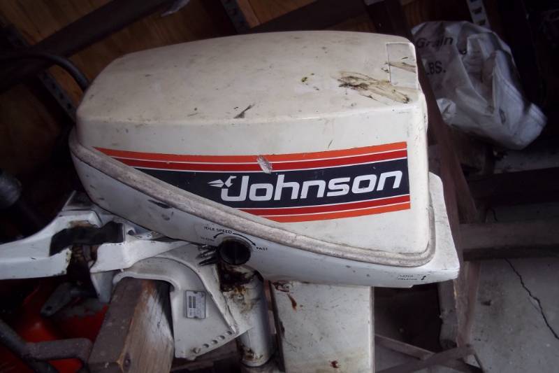 lot 144 image: 15 hp Johnson outboard motor  stand not included