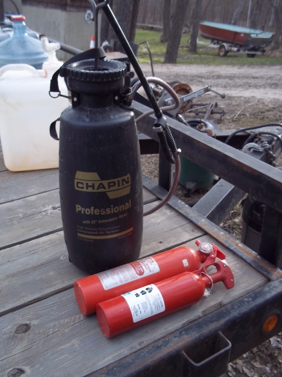 lot 234 image: Yard sprayer and 2 fire extingushires