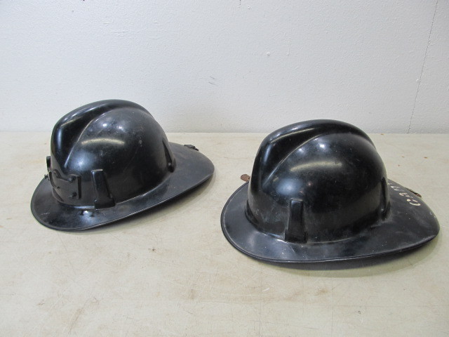 lot 55 image: Pair of Vintage Fire Helmets