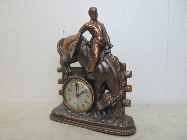 lot 59 image: Vintage Rodeo Cowboy Metal Mantel Clock