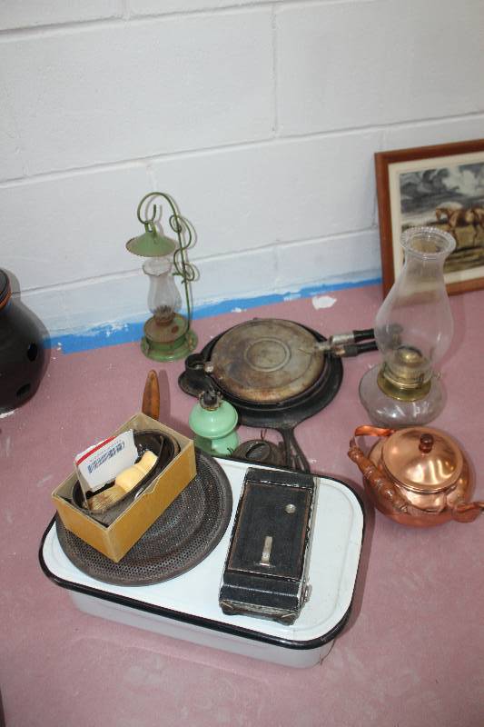 lot 1642 image: Oil Lamps, Waffle Maker, Tea Pot, And More
