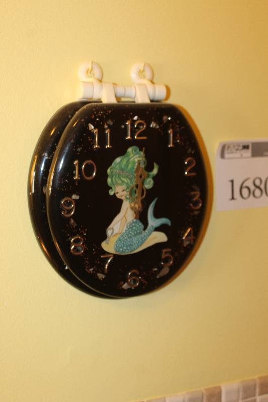 lot 1680 image: Mermaid Toilet Seat Wall Clock