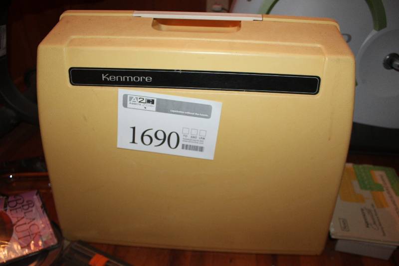 lot 1690 image: Kenmore Convertible Sewing Machine w Owner Manual