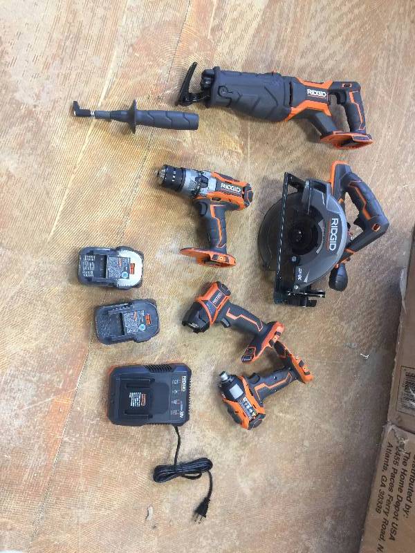 lot 62 image: RIDGID GEN5X 18-Volt Lithium-Ion Cordless Combo Kit (5-Piece) in like new worling conditions