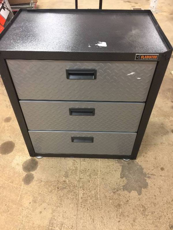 lot 69 image: Gladiator Premier Series Pre-Assembled 35 in. H x 28 in. W x 25 in. D Steel 5-Drawer Rolling Garage Cabinet in Silver Tread open box never used