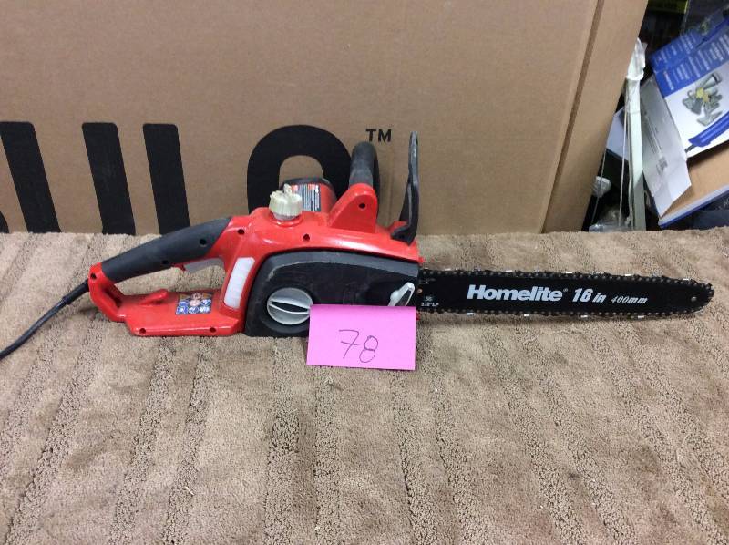 lot 78 image: Homelite 14 in. 9 Amp Electric Chainsaw in working conditions