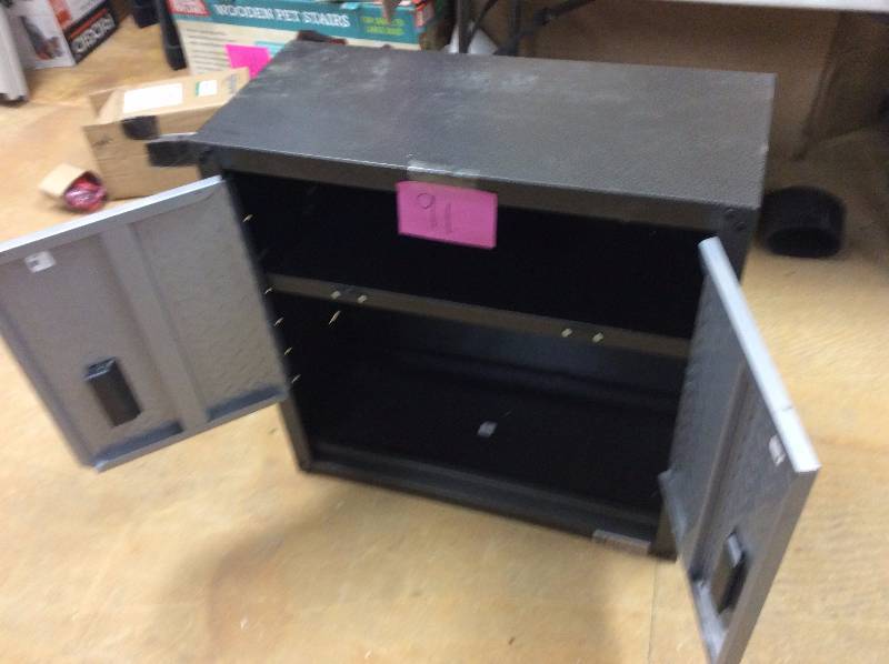 lot 91 image: Gladiator Ready to Assemble 28 in. H x 28 in. W x 12 in. D Steel 2-Door Garage Wall Cabinet with Shelf in Silver Tread Model#  GAWG28KDYG not used