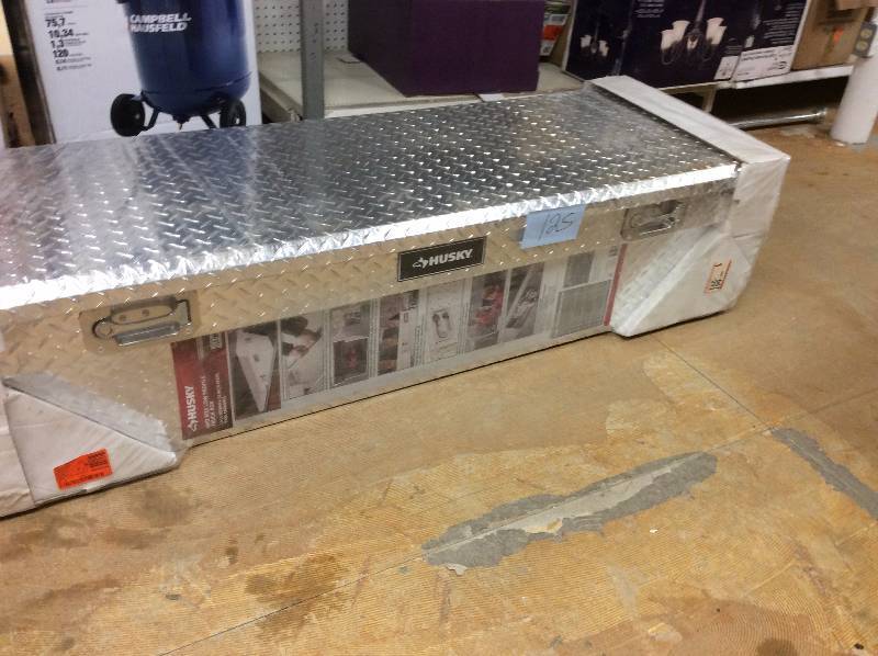 lot 125 image: Husky 62 in. Aluminum Polished Mid Sized Low Profile Truck Box Model#  THD62LP New