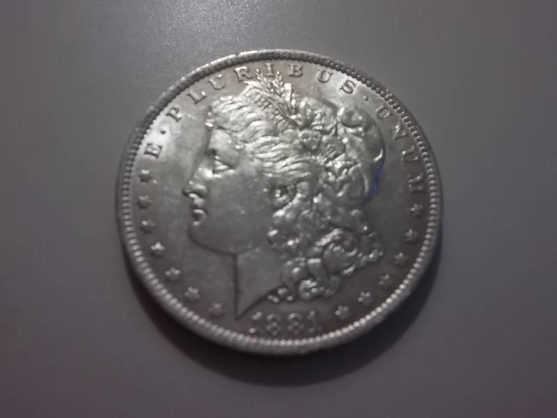 1881 O Morgan Silver Dollar Very High Grade MS (In MS60 $70.00)