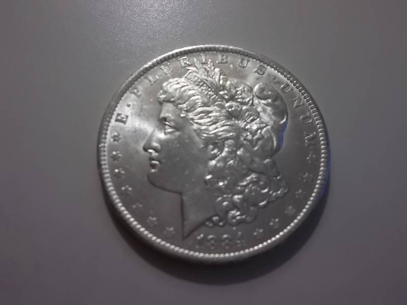 1884 O Morgan Silver Dollar Higher Grade MS (In MS60 Valued $70.00)