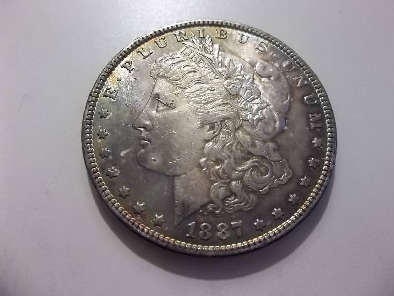 1887  Morgan Silver Dollar Very High Grade  MS- Nice Rainbow Patina