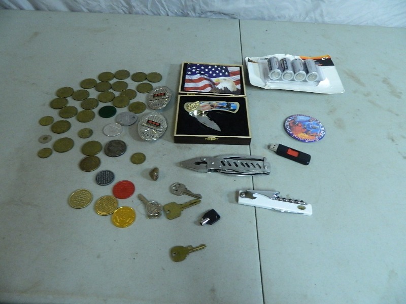 lot 16 image: Knives, Tokens, and More