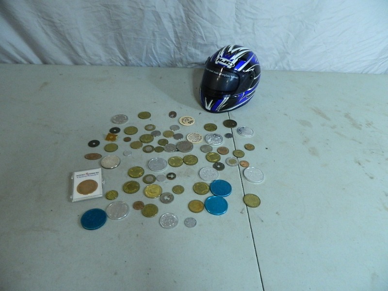 lot 18 image: Tokens  Coins and Dirt Bike Helmet Bank