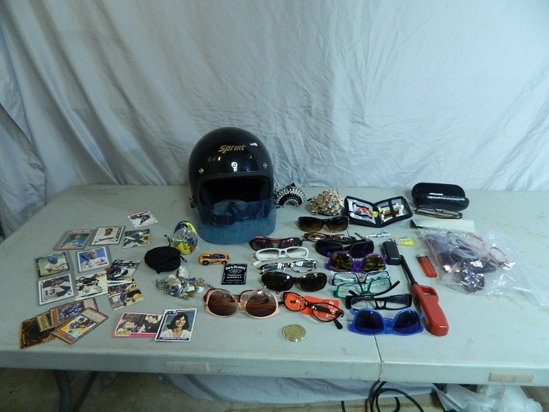 lot 31 image: Helmet, Glasses, Sports Cards, and More