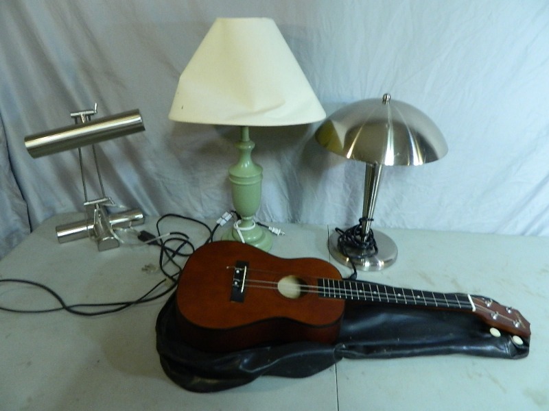 lot 102 image: Guitar and Lamps