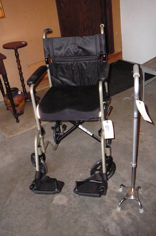 lot 80 image: Wheel chair & Cane