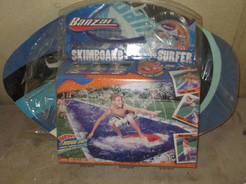 lot 35 image: skim board surfer w 26 surf-n-slide