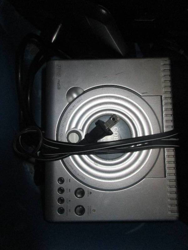 lot 49 image: DVD player - RCA Bluetooth speakers - HP monitor HPLV1911