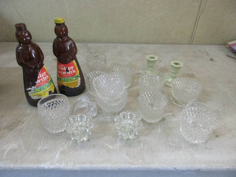 lot 66 image: glass tea light set and 2 vintage Mrs. Buttersworth glass bottles