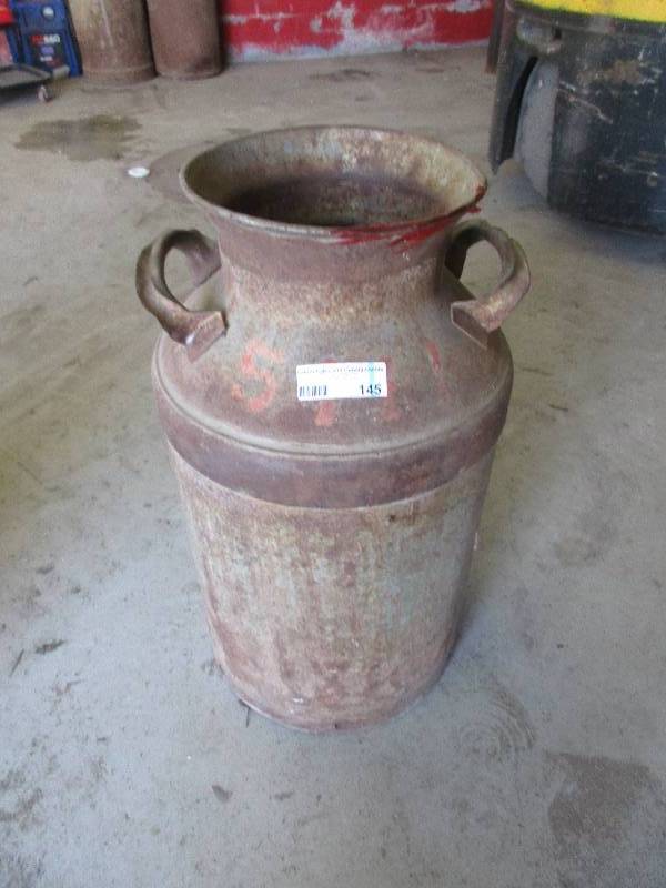 lot 145 image: vintage metal milk jug