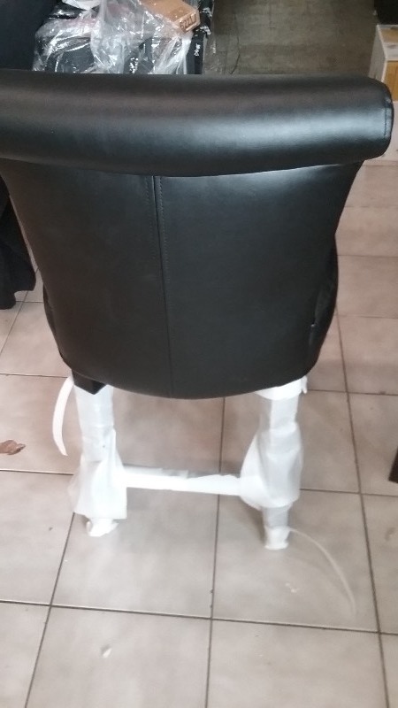 lot 6 image: Faux Black Leather Accent Bar Stool