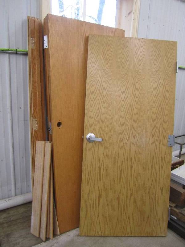 Lot of 6 heavy wood doors with trim...