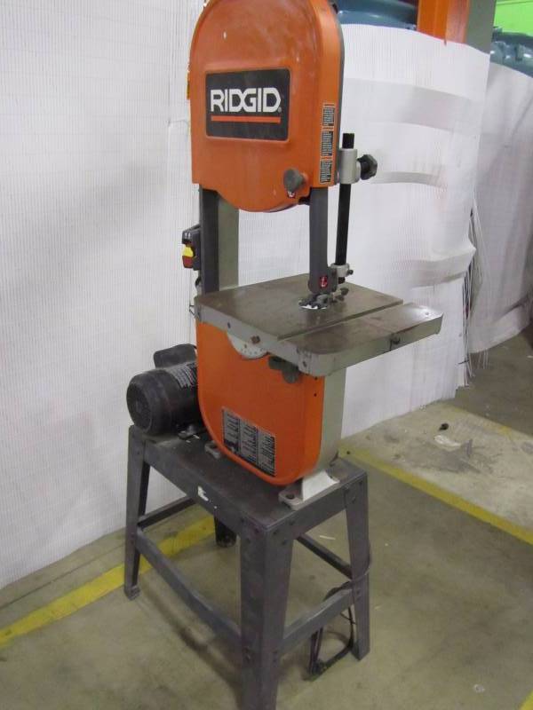 lot 12 image: Ridgid 15 amp band saw with stand