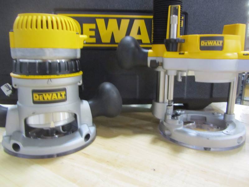 lot 30 image: Dewalt 2 14 hp electronic variable speed fixed base and  plunge router