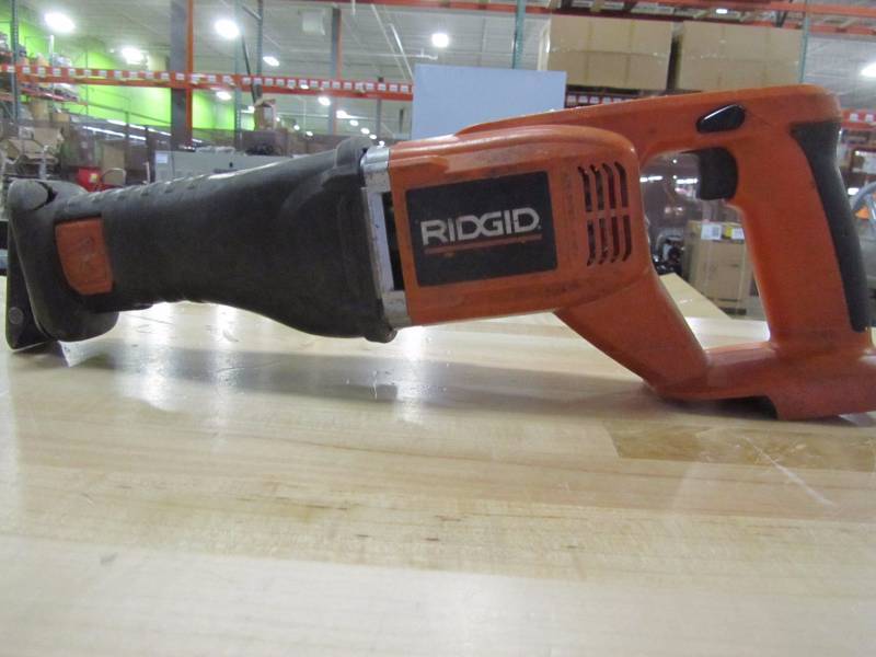 lot 33 image: Ridgid X4 18-volt cordless reciprocating saw console (sawzall)