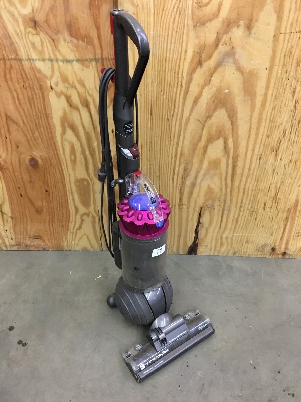 lot 17 image: Dyson DC65 Vacuum Cleaner ...