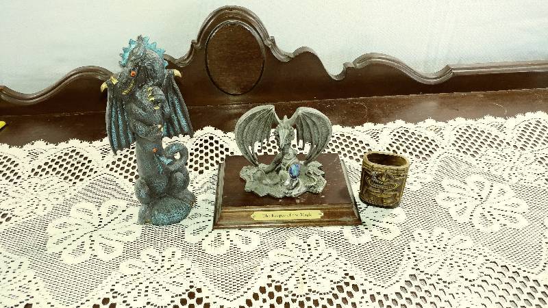 lot 220 image: Dragons and Tiki Figure