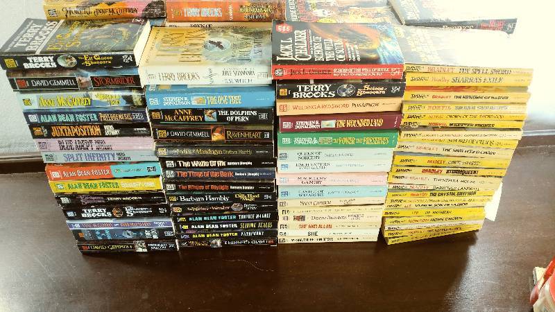 lot 139 image: Collection of 64 Del Rey and DAW BooksNovels